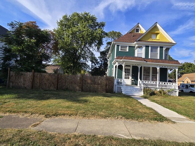 702 Franklin St, Waukegan, IL 60085 - victorian house featuring covered porch