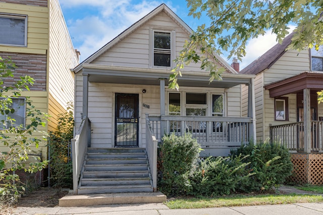 bungalow-style home with covered porch