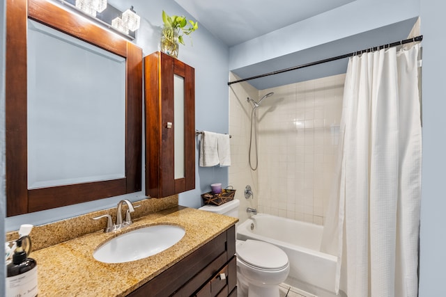 full bathroom with vanity, toilet, tile patterned floors, and shower / tub combo