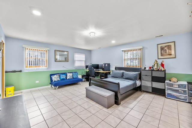 bedroom with light tile patterned flooring