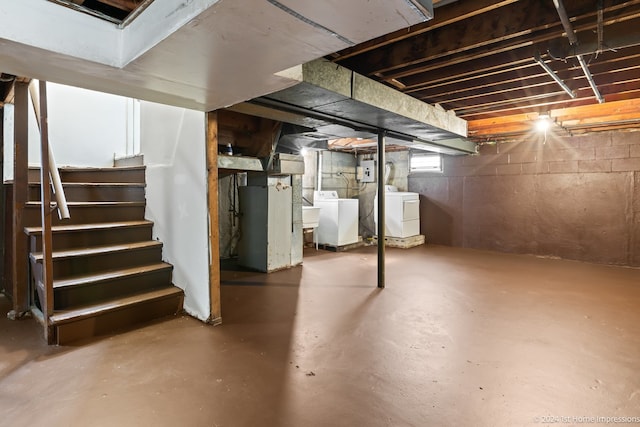 basement featuring washer and dryer