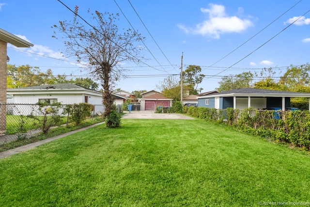 view of yard with a garage