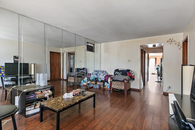 living room featuring dark hardwood / wood-style floors