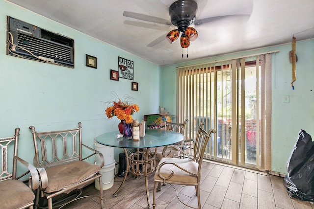 dining area featuring light wood-type flooring and ceiling fan