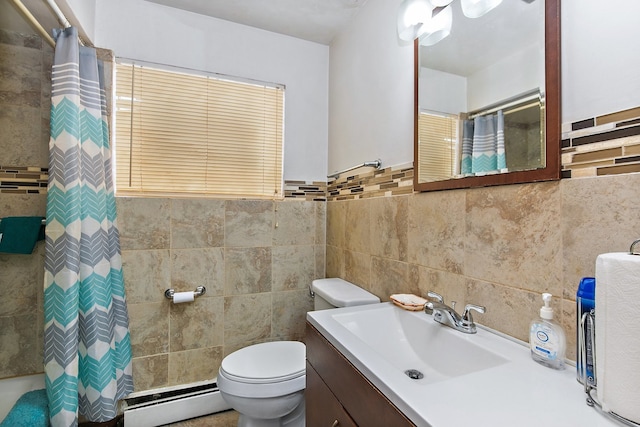 bathroom featuring tile walls, vanity, toilet, and a baseboard radiator