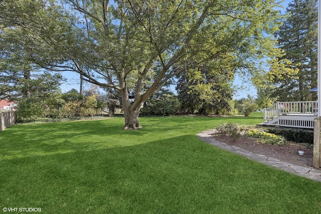 view of yard with a deck