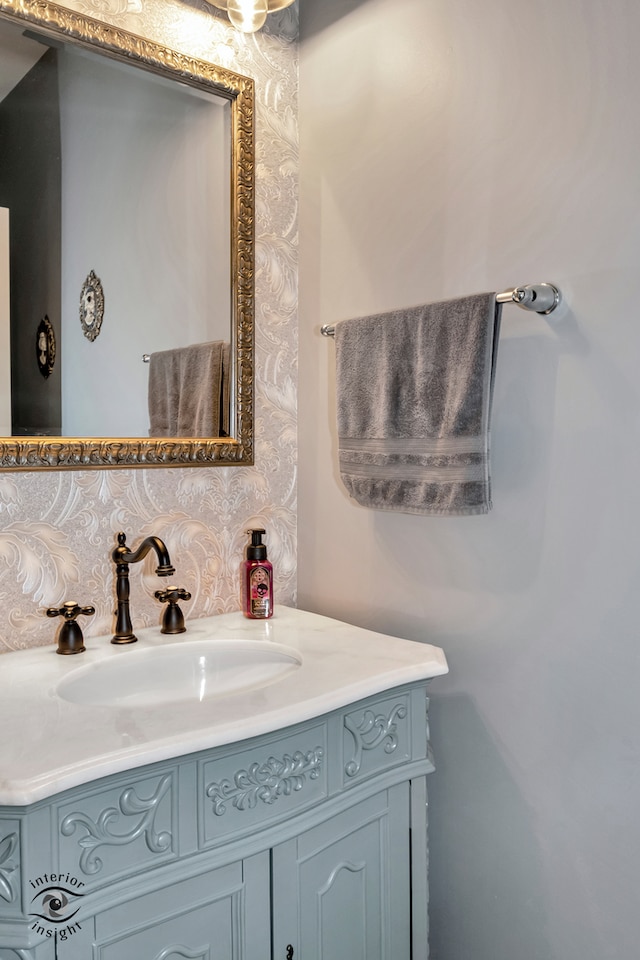 bathroom with vanity and backsplash