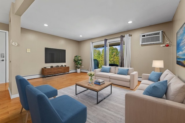 living room with light hardwood / wood-style floors, a wall unit AC, and a baseboard radiator