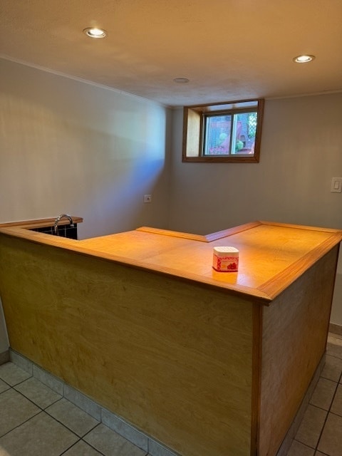 bar with light tile patterned floors