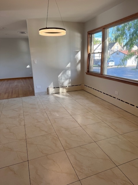 unfurnished room featuring light hardwood / wood-style flooring