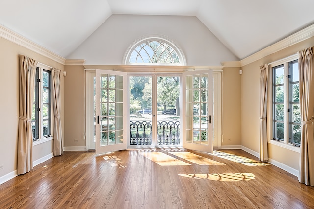 doorway to outside with light hardwood / wood-style floors and a wealth of natural light