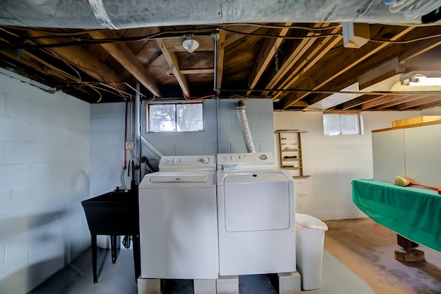 washroom with independent washer and dryer