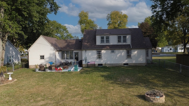 back of house featuring a yard and a patio