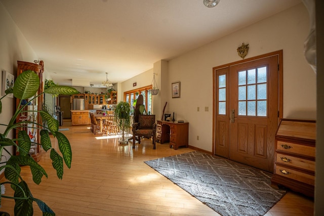 802 Union Rd, Harmon, IL 61042 - entryway with a chandelier and light wood-type flooring