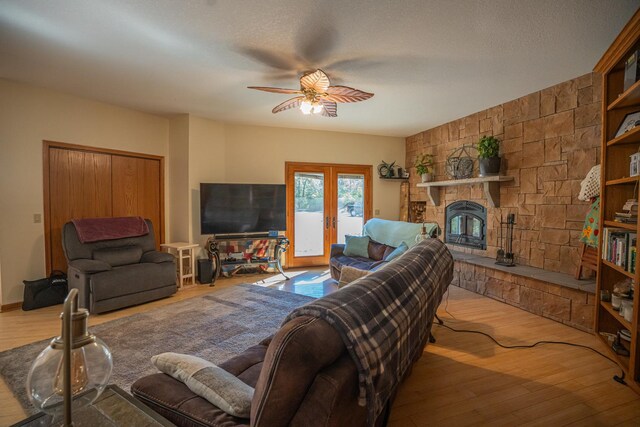 802 Union Rd, Harmon, IL 61042 - living area with a ceiling fan, wood finished floors, and a stone fireplace