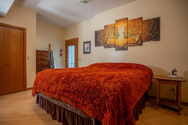 802 Union Rd, Harmon, IL 61042 - bedroom featuring light wood-style floors, access to exterior, and baseboards