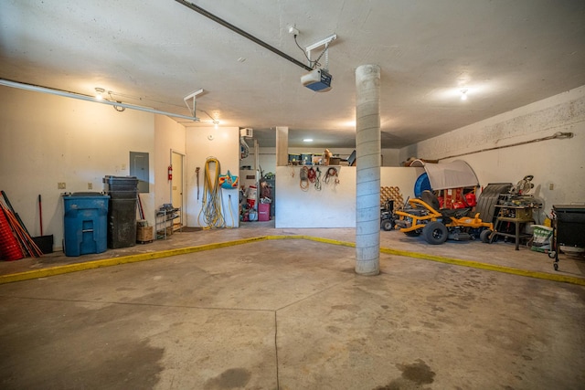 802 Union Rd, Harmon, IL 61042 - garage with a garage door opener and electric panel
