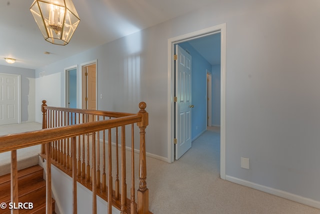 corridor featuring carpet floors