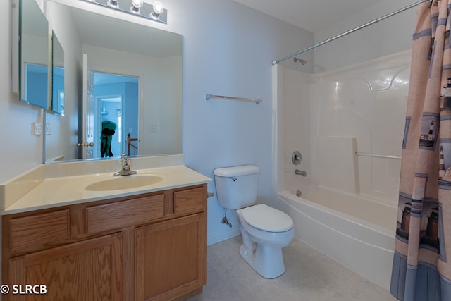 full bathroom with vanity, shower / tub combo, and toilet