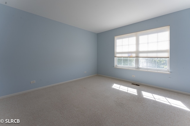 empty room with carpet flooring