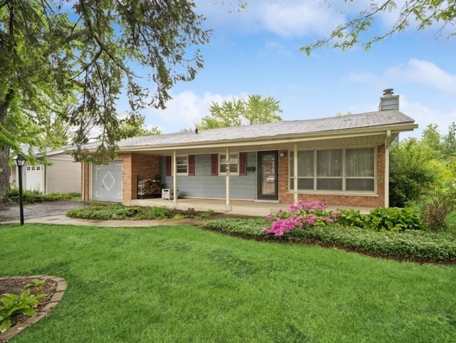 1087 Cedar Ln, Northbrook, IL 60062 - ranch-style house with a garage, a chimney, and a front yard