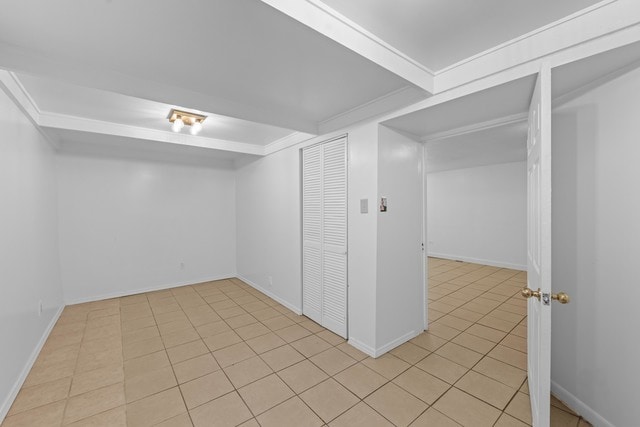 basement with light tile patterned floors