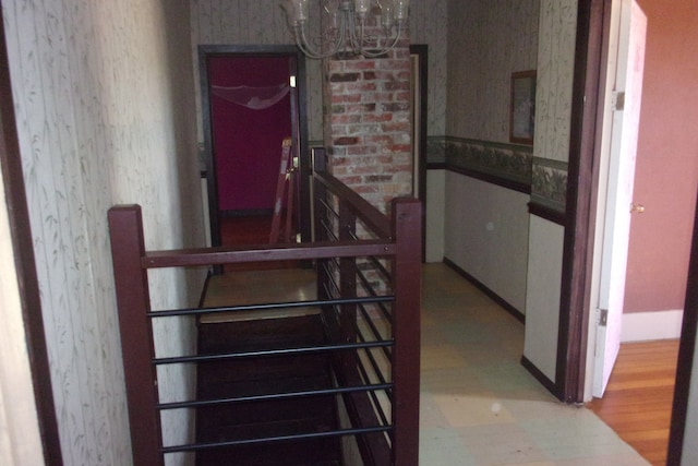 stairs featuring hardwood / wood-style floors