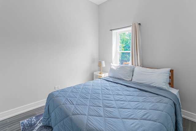 bedroom featuring hardwood / wood-style floors