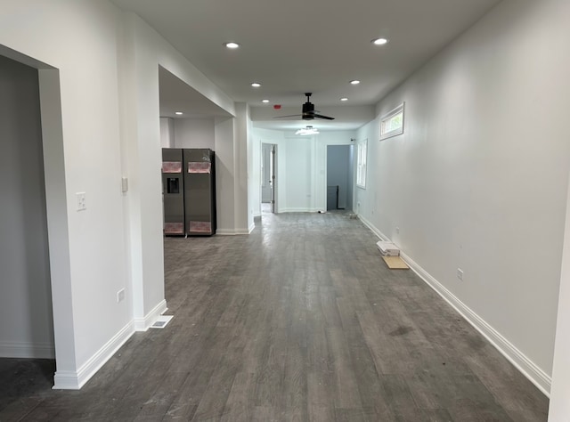 hallway featuring dark hardwood / wood-style floors