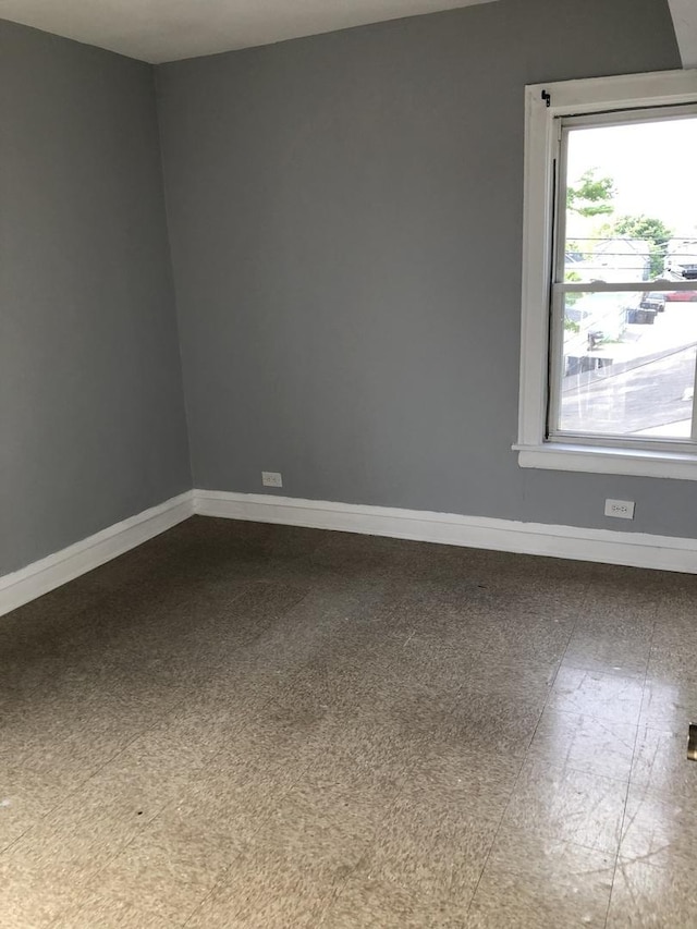 1813 Dempster St, Evanston, IL 60201 - empty room featuring baseboards