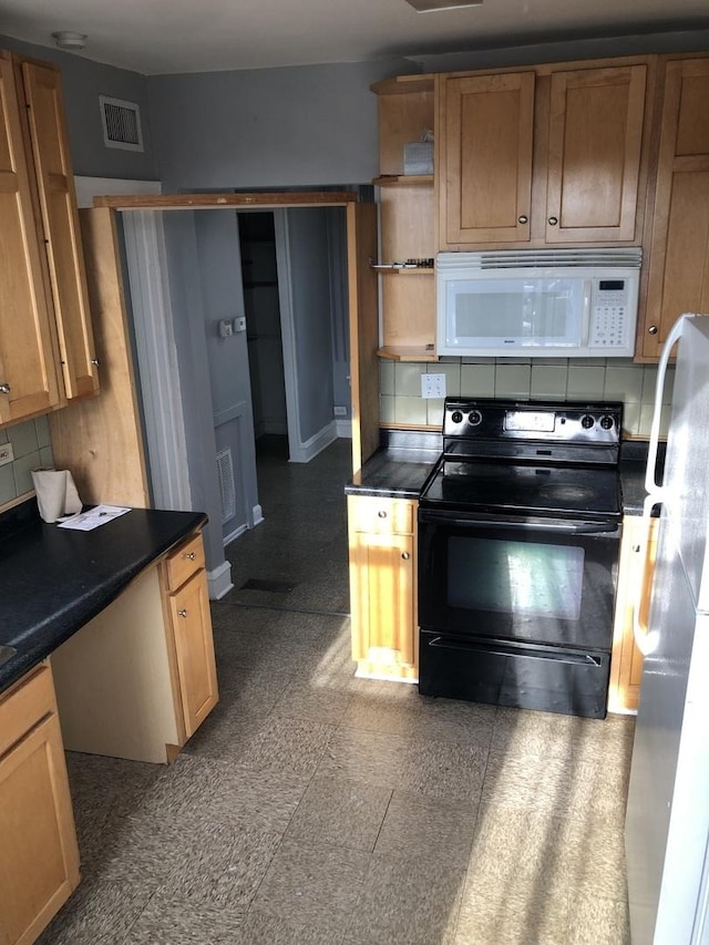1813 Dempster St, Evanston, IL 60201 - kitchen with white microwave, freestanding refrigerator, open shelves, visible vents, and black range with electric stovetop