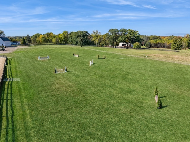 view of home's community with a yard