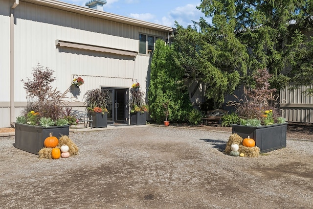 back of property featuring a patio