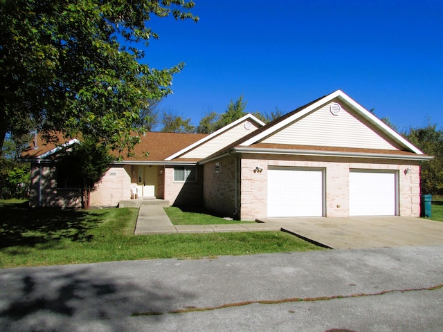 single story home with a garage and a front lawn