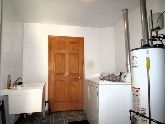 washroom featuring washer / clothes dryer and gas water heater