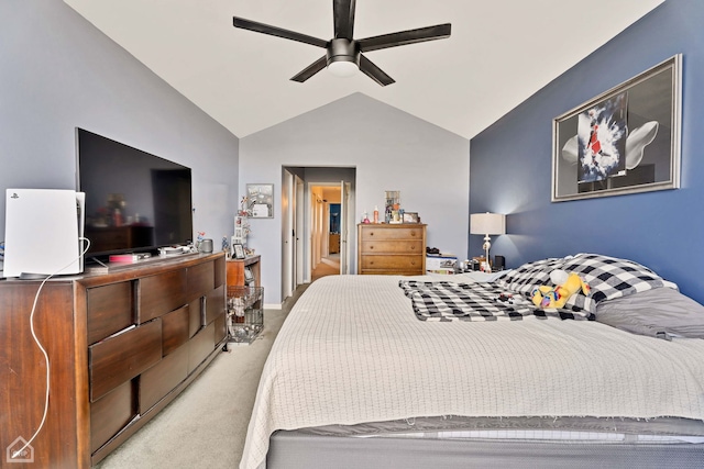 carpeted bedroom featuring vaulted ceiling and ceiling fan