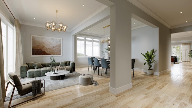 living room featuring a notable chandelier, light wood-type flooring, and ornamental molding