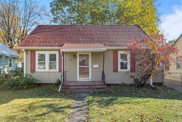 bungalow with a front lawn