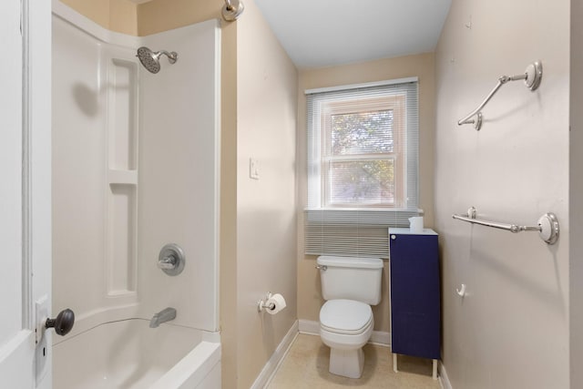 bathroom with washtub / shower combination and toilet