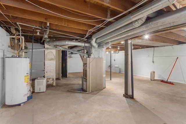 basement with water heater and heating unit