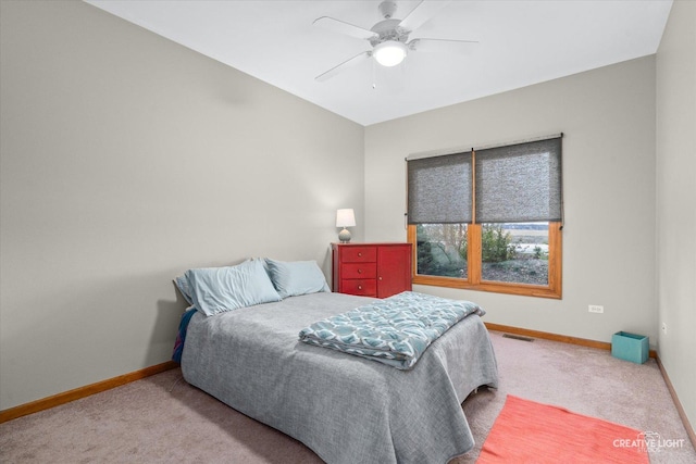 bedroom with ceiling fan and carpet