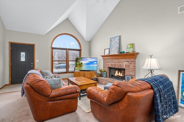 carpeted living room featuring lofted ceiling and a fireplace