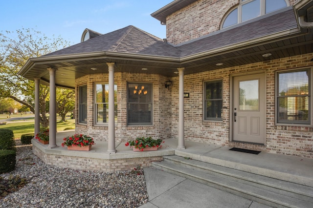 entrance to property with covered porch