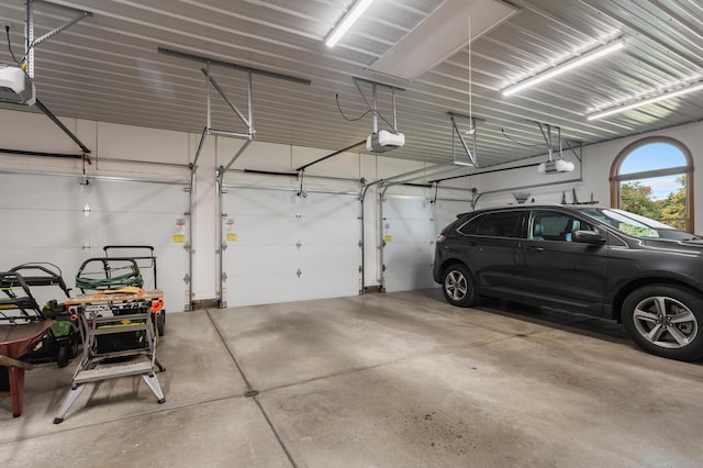 garage featuring a garage door opener