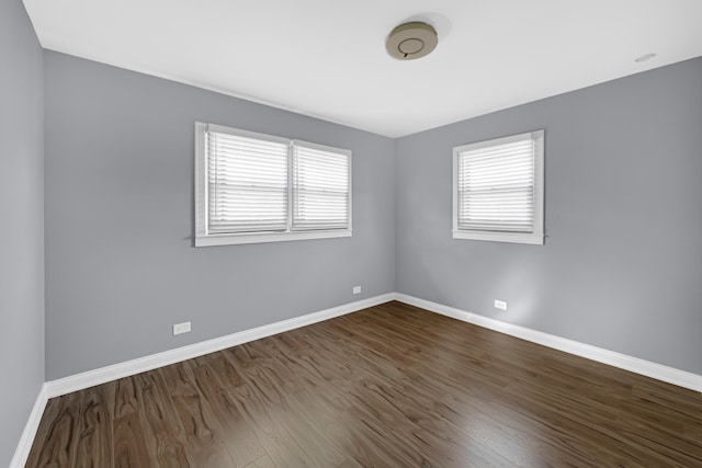 spare room featuring hardwood / wood-style flooring