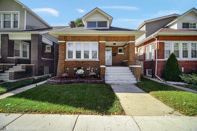 view of front of home with a front yard