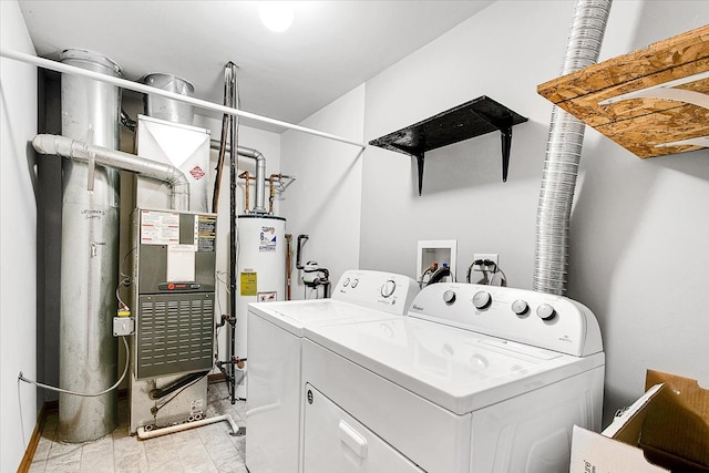 laundry room featuring washing machine and dryer