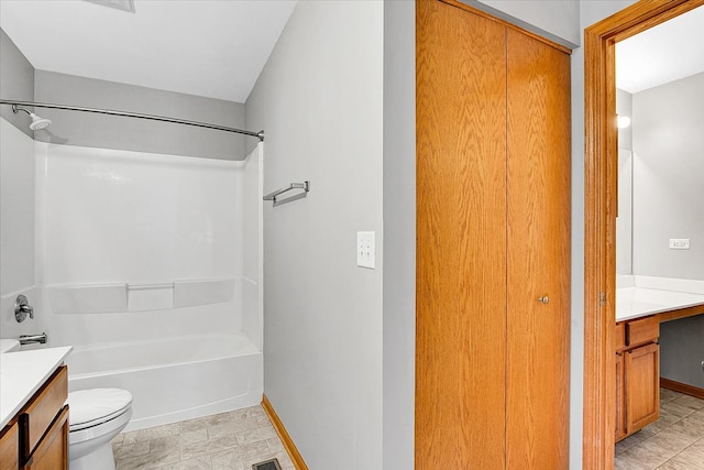 full bathroom featuring vanity, toilet, tile patterned floors, and shower / bathing tub combination