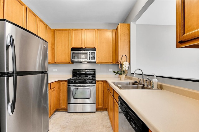 kitchen with sink and stainless steel appliances