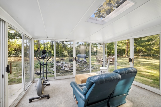 sunroom / solarium featuring a skylight and plenty of natural light